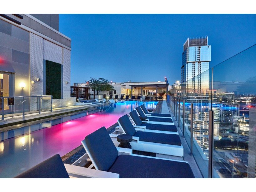 The Bowie highrise apartment roof top pool revealing a beautiful aerial view of Austin.