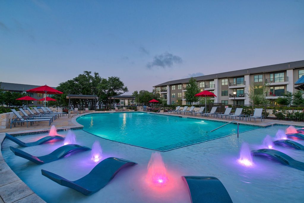 A well lit pool for some night time swimming at the Lantana Hill Apartments.