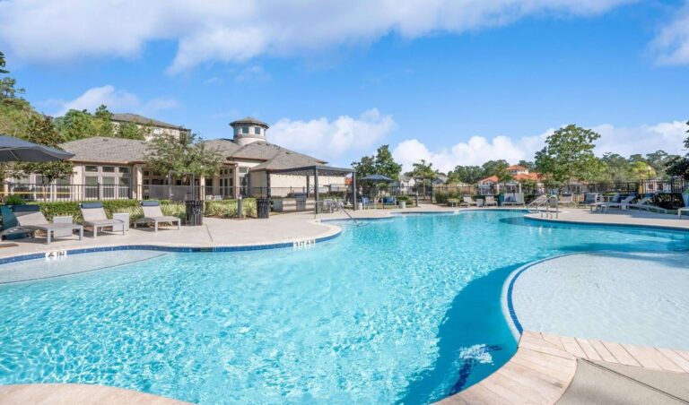 Berkshire Jones Forest apartments pool and building exterior, Houston